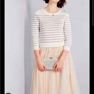 grey-and-white striped too Swiss-dotted tulle skirt of this adorable A-line.